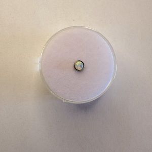 Bezel set opal cabochon